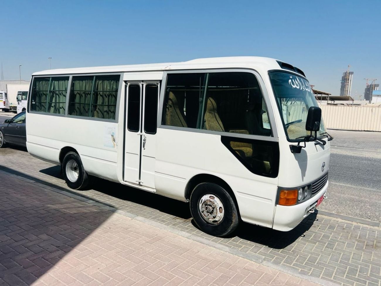 Toyota Coaster minibus in Sharjah for Minibus Rental Sharjah