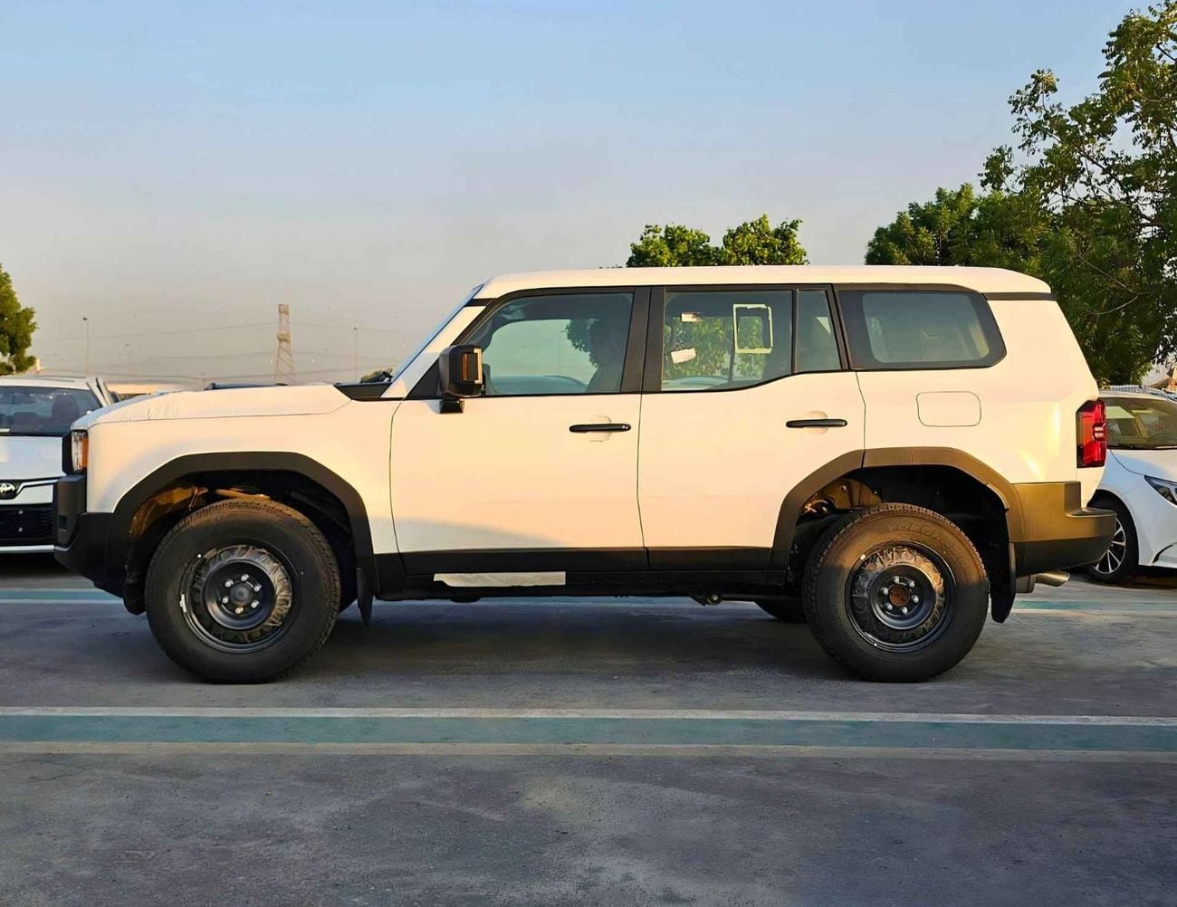 Toyota Prado TX1 LC250 URBAN / 2.4L PETROL 4WD / DVD+CAMERA / COOL BOX / FABRIC SEATS (CODE # PR24U)