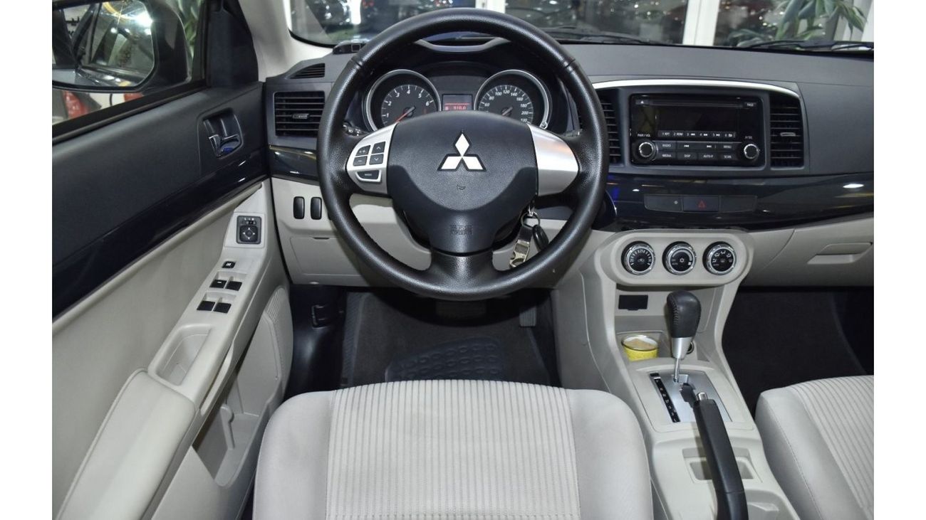 Mitsubishi Lancer EXCELLENT DEAL for our Mitsubishi Lancer GLS ( 2016 Model ) in Silver Color GCC Specs