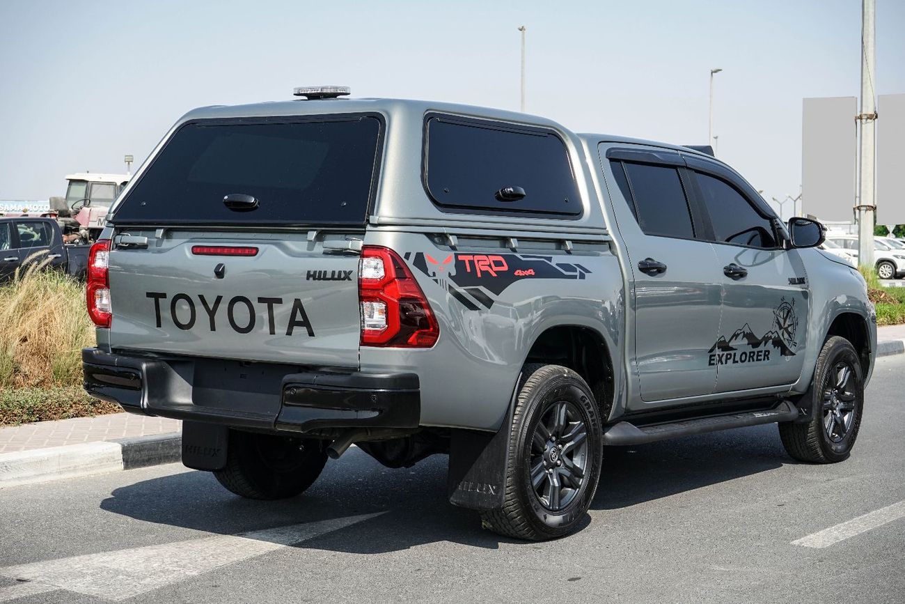 Toyota Hilux A Hilux canopy is a protective shell with a roof, walls, and windows that fits over the tray of a To