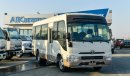 Toyota Coaster 4.2L V6 M/T Diesel 23 passengers - 16″ wheels - brown interior