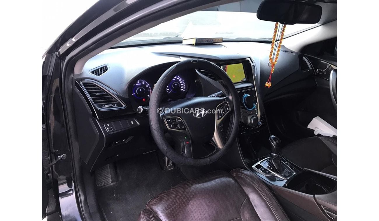 هيونداي أزيرا هيونداي ازيرا موديل 2013 خليجي صبغه وكاله فل اوبشن  بانوراما مثبت سرعه زكي كراسي جلد تبريد وتسخين