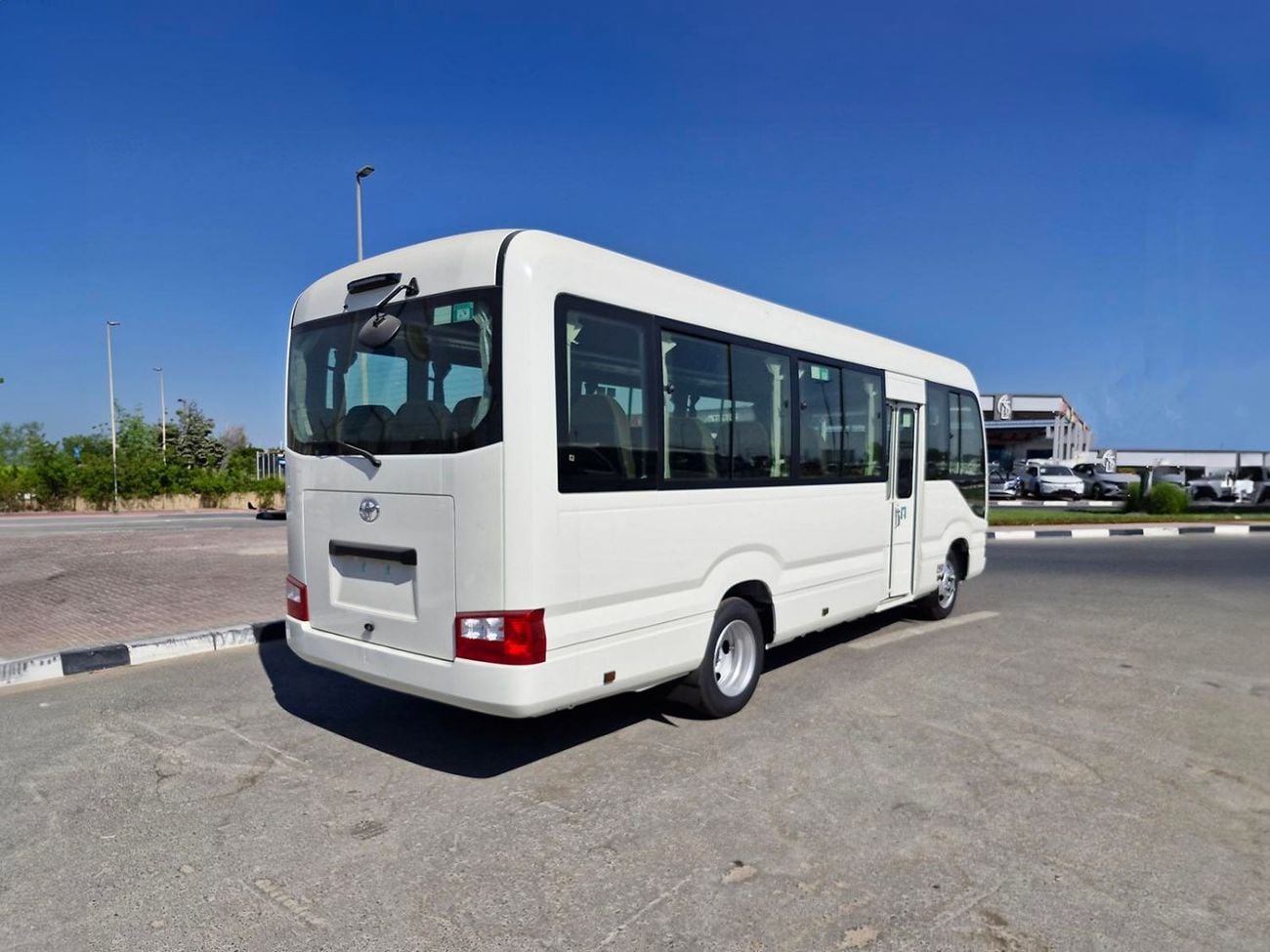 Toyota Coaster  ECTALM003 - 2026 Toyota Coaster – 2.8L Diesel Auto – 22 Seats, Cool Box