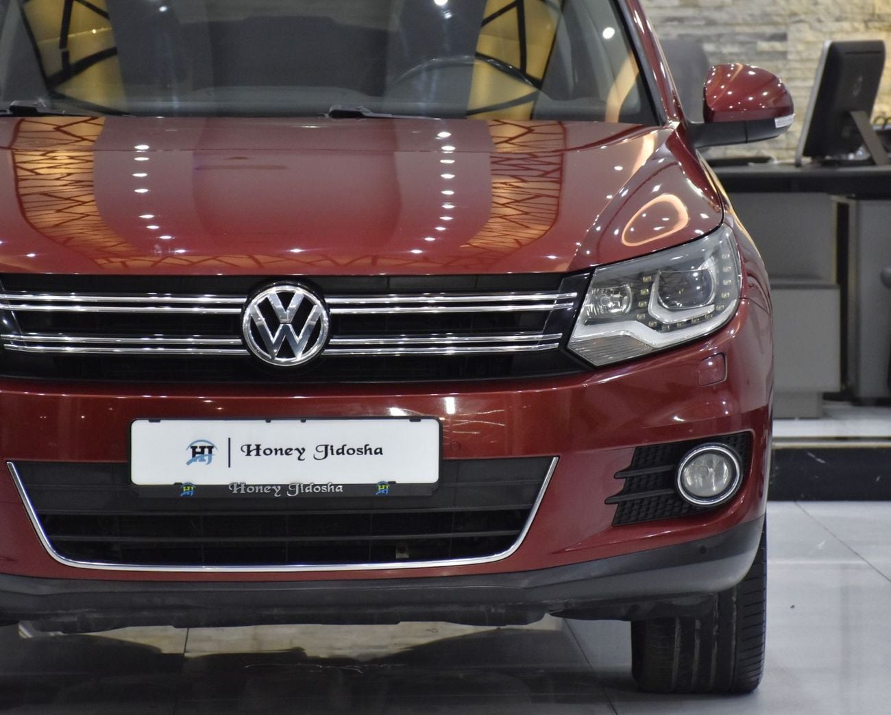 Volkswagen Tiguan SEL EXCELLENT DEAL for our Volkswagen Tiguan 2.0 TSi 4Motion ( 2014 Model ) in Red Color GCC Specs