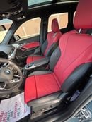 BMW X1 Veganza Coral Red/Black Interior