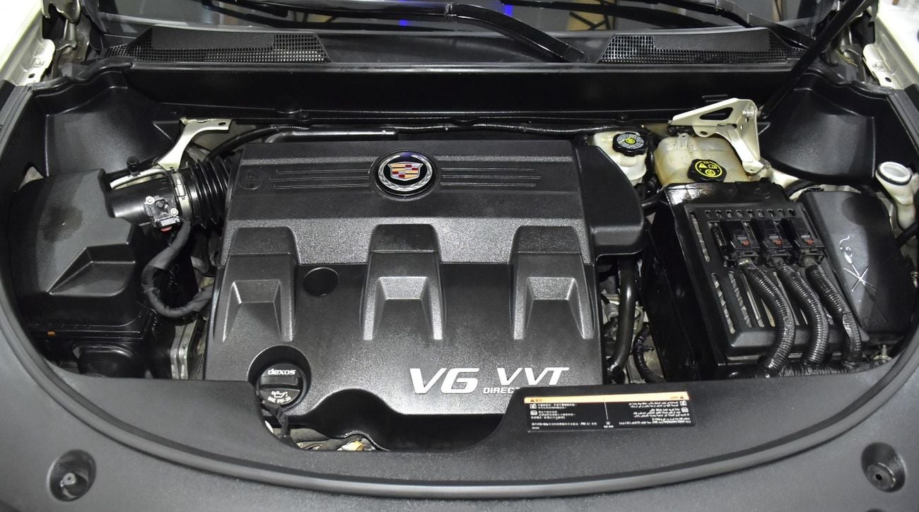 Cadillac SRX EXCELLENT DEAL for our Cadillac SRX4 3.6 ( 2016 Model ) in Golden Color GCC Specs