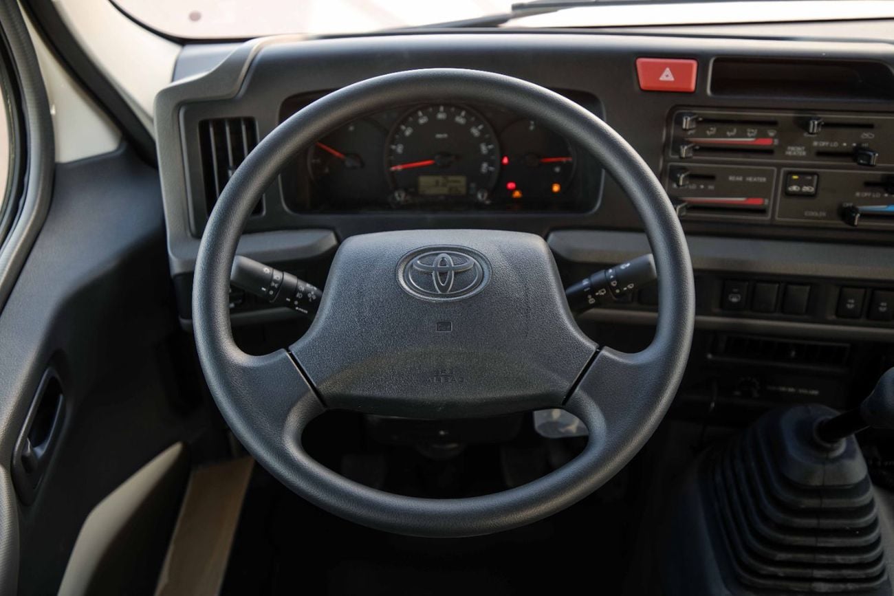 Toyota Coaster 2.7L (23-Seater) - White Inside Grey | Export Only