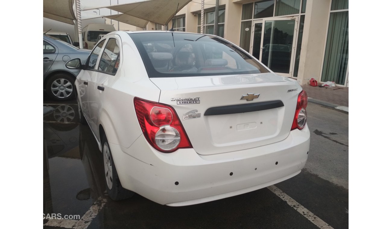 Chevrolet Sonic 2014 WHITE GCC NO PAIN NO ACCIDENT PERFECT