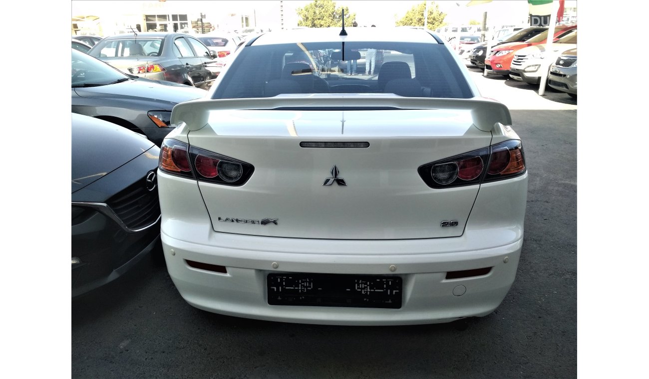 Mitsubishi Lancer 2015 WHITE GCC NO PAIN NO ACCIDENT PERFECT