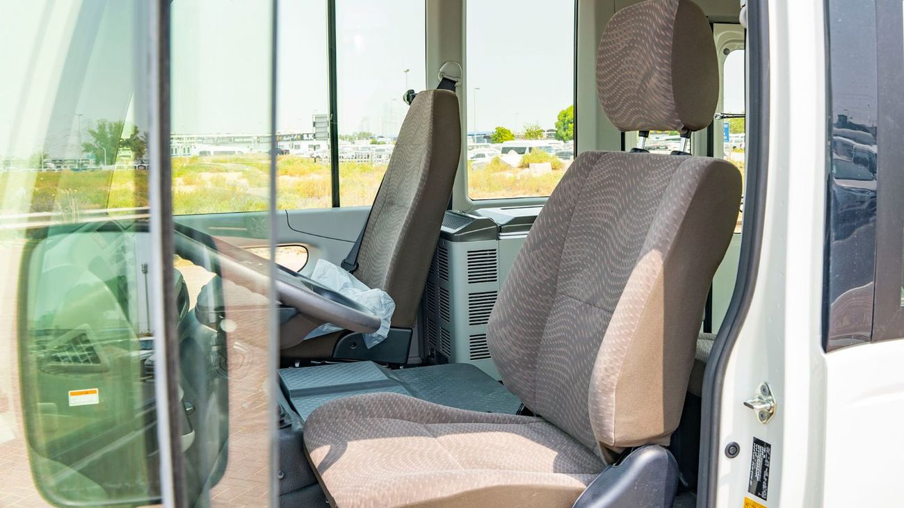 تويوتا كوستر 2026 Toyota Coaster 4.0L Diesel MT 22 seaters Electric doors with Fridge