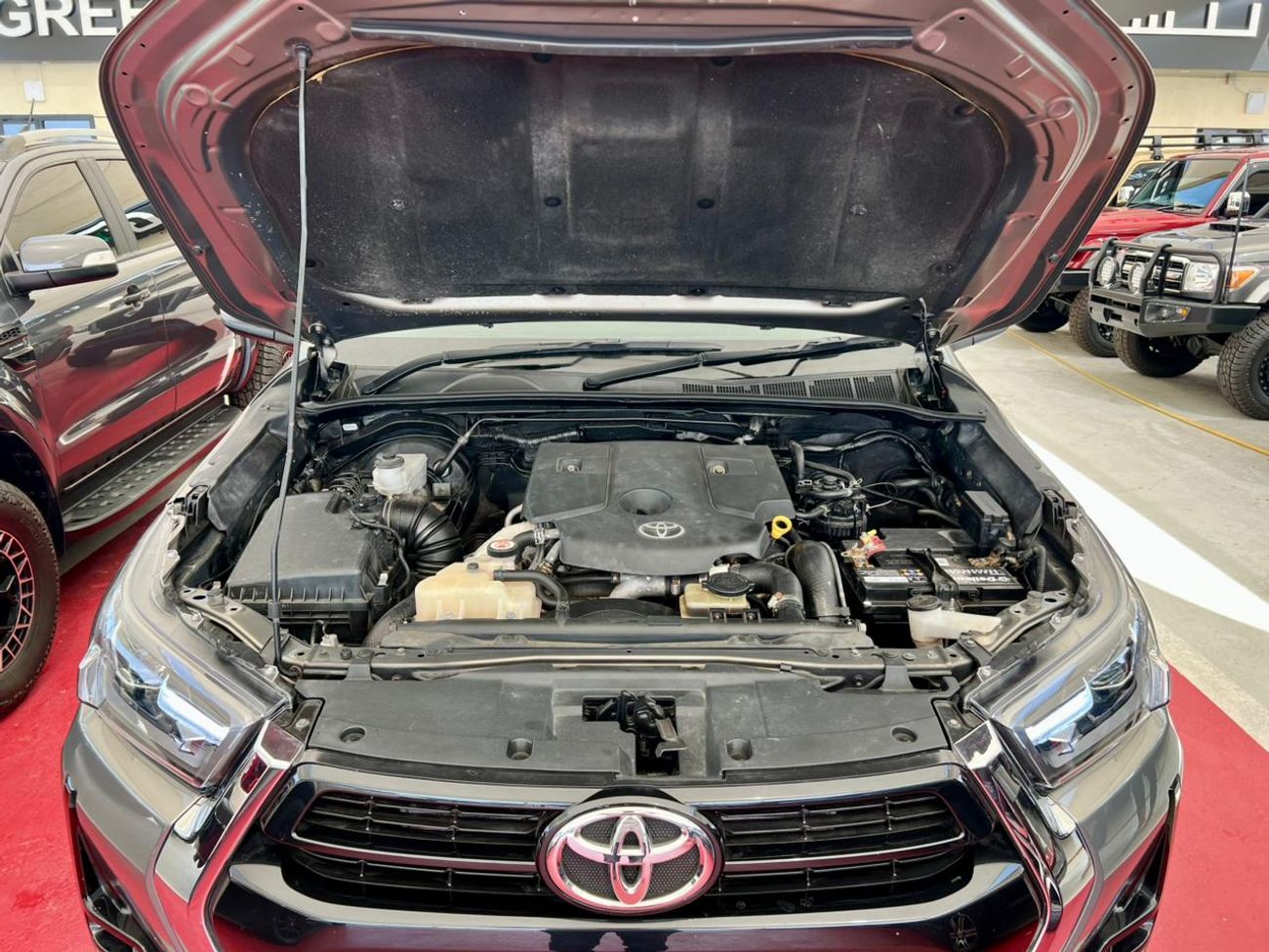 تويوتا هيلوكس The Toyota Hilux is a legendary, mid-size pickup truck known for its exceptional ruggedness, durabil