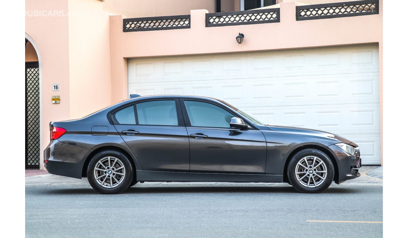 BMW 316i i 2013 GCC under Warranty with Zero downpayment.