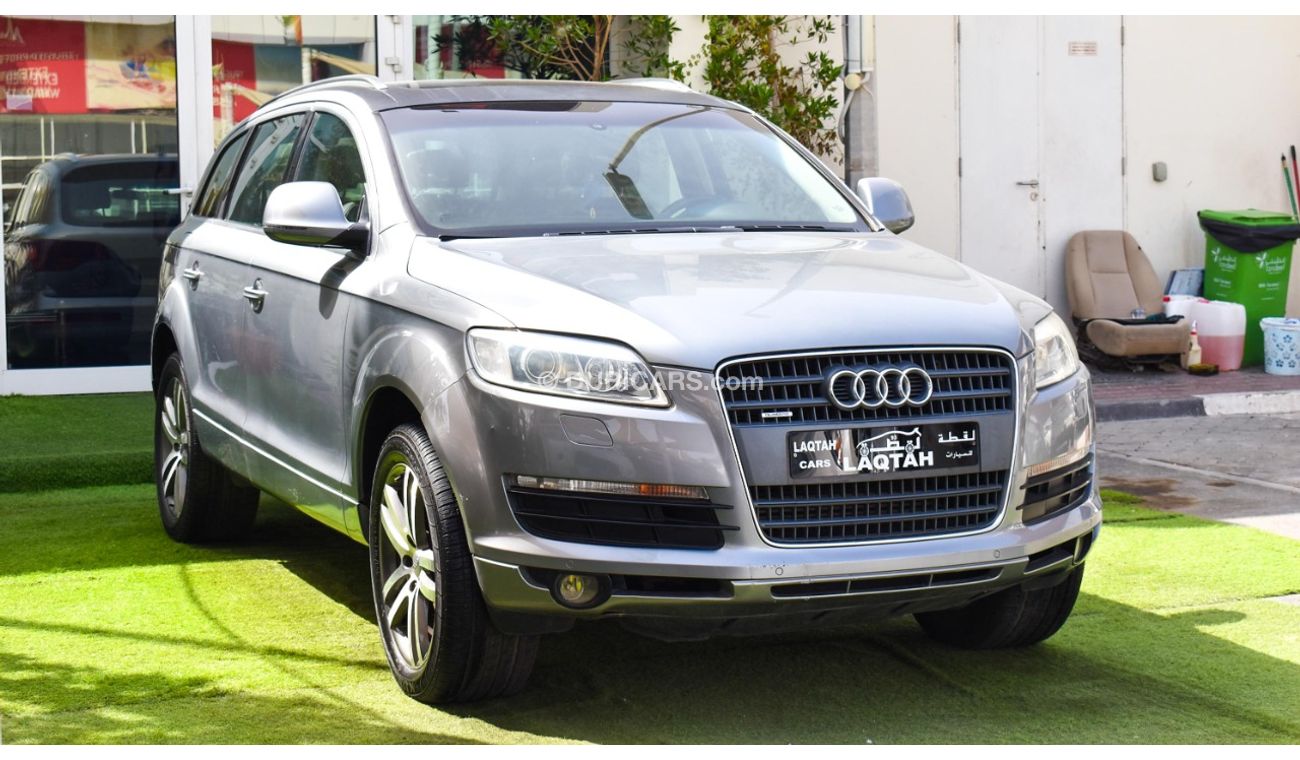 Audi Q7 2009 GCC model, silver color, saffron interior, leather panorama, cruise control, sensor wheels, in