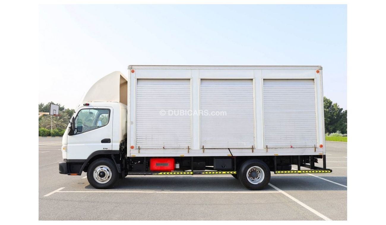 Mitsubishi Fuso Canter | Long Chassis | Shutter Box Water Body | Excellent Condition | GCC