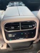 Jetour G700 2.0L Turbo engine with dual electric motors, delivering a combined 724 horsepower and 795 Nm torque,