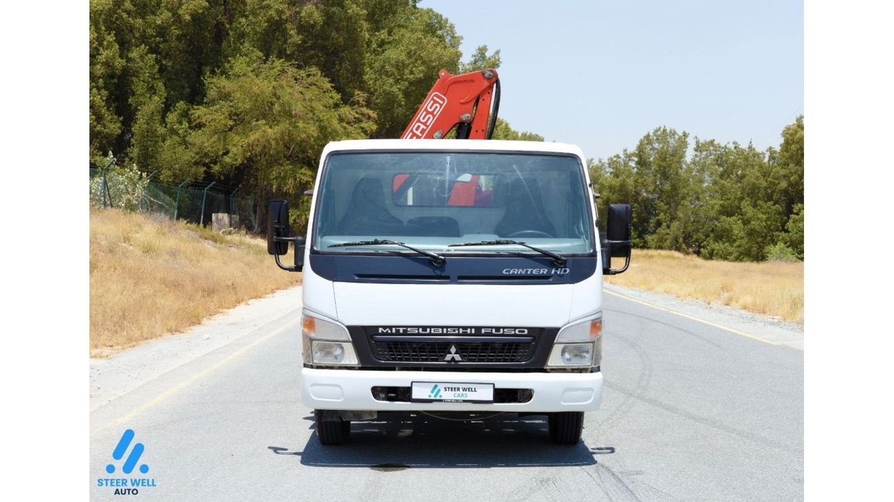 Mitsubishi Fuso Canter HD Fuso - Cargo Body with Fassi Crane - 4.2L RWD - DSL - MT - Book Now!