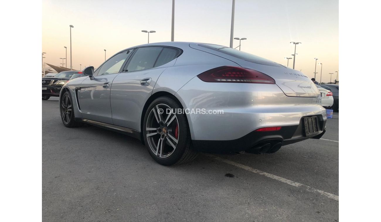 بورش باناميرا موديل 2014 خليجي فل مواصفات كراسي جلد ومثبت سرعه وتحكم كهربي كامل ونظام صوت ممتاز وكاميرا خلفيه ومثب