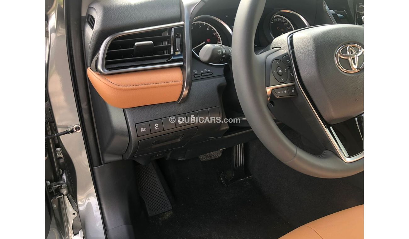 Toyota Camry TOYOTA_CAMERY_GRANDE_2023_3.5L_avaialable_white_black_hybrid