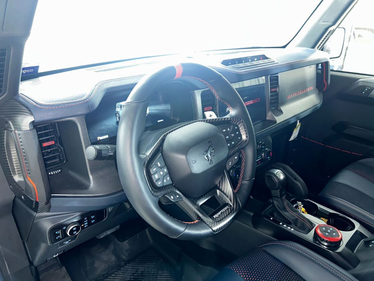 Ford Bronco Raptor B4D4925 BRONCO 4 DOORS RAPTOR 3.0L V6 ECOBOOST W/ ORANGE SBELTS BLACK/BLUE LTHR SSQTCH