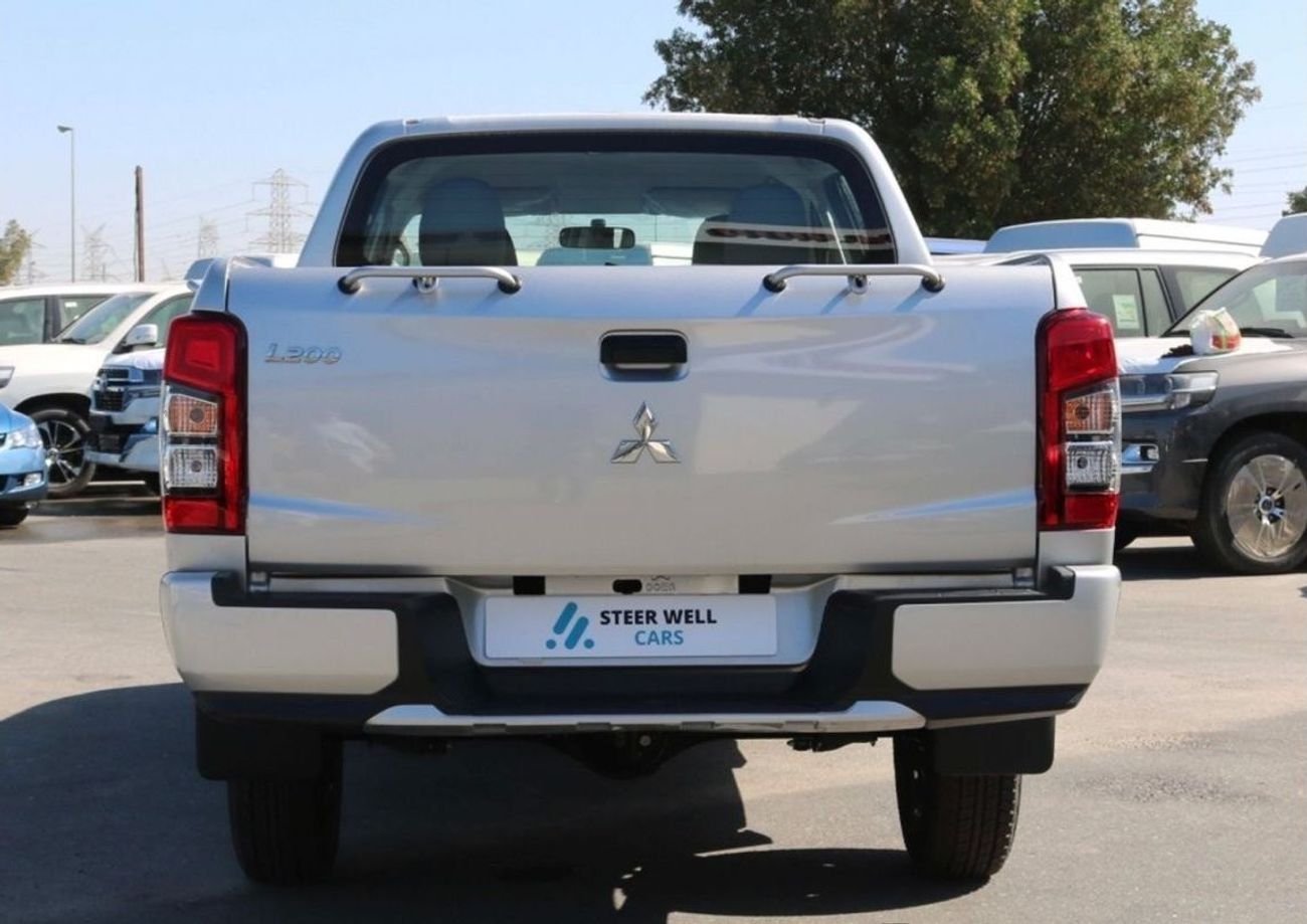 ميتسوبيشي L200 DIESEL - 2.4L -  DOUBLE CABIN - 4X4 - 5MT - POWER LOCKS AND POWER WINDOWS - EXPORT ONLY