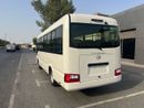 Toyota Coaster 4.0L ECTTAE004 - 2026 Toyota Coaster - 4.0L Diesel Manual – 23 Seats, Auto Door, 3PSB, Mic, Baggage Rack