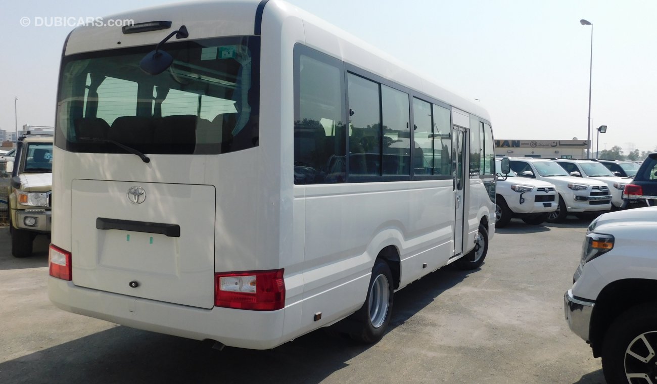 تويوتا كوستر 4.2L M/T Diesel 23 passengers - Auto folding door