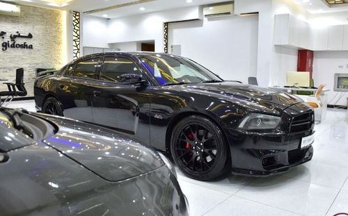 Dodge Charger EXCELLENT DEAL for our Dodge Charger SRT8 ( 2013 Model ) in Black Color GCC Specs
