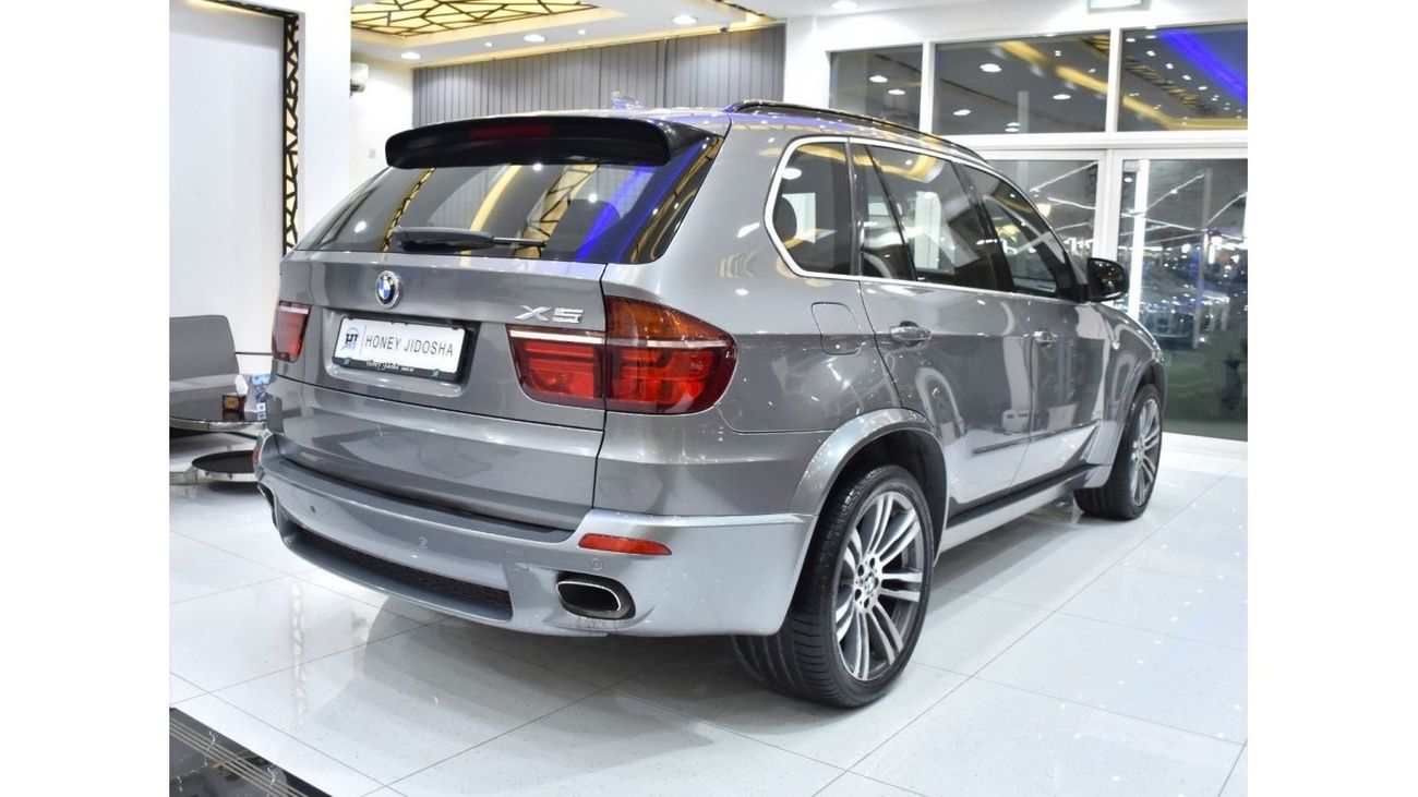 BMW X5 EXCELLENT DEAL for our BMW X5 xDrive50i ( 2012 Model ) in Grey Color GCC Specs