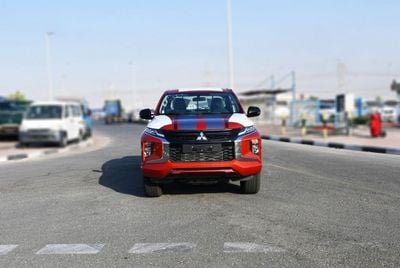 ميتسوبيشي L200 ميتسوبيشي L200 ديزل فل أوبتيون أوتوماتيك 2.4 لتر برتقالي من الخارج أسود من الداخل