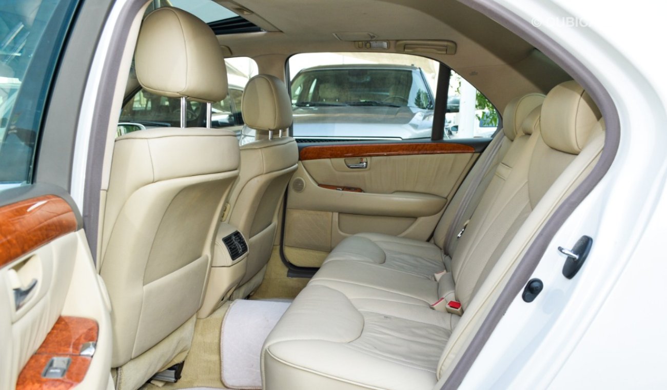 Lexus LS 430 Imported 1/2 Ultra, model 2006, white color, leather opening, wooden wheels, electric mirrors, excel