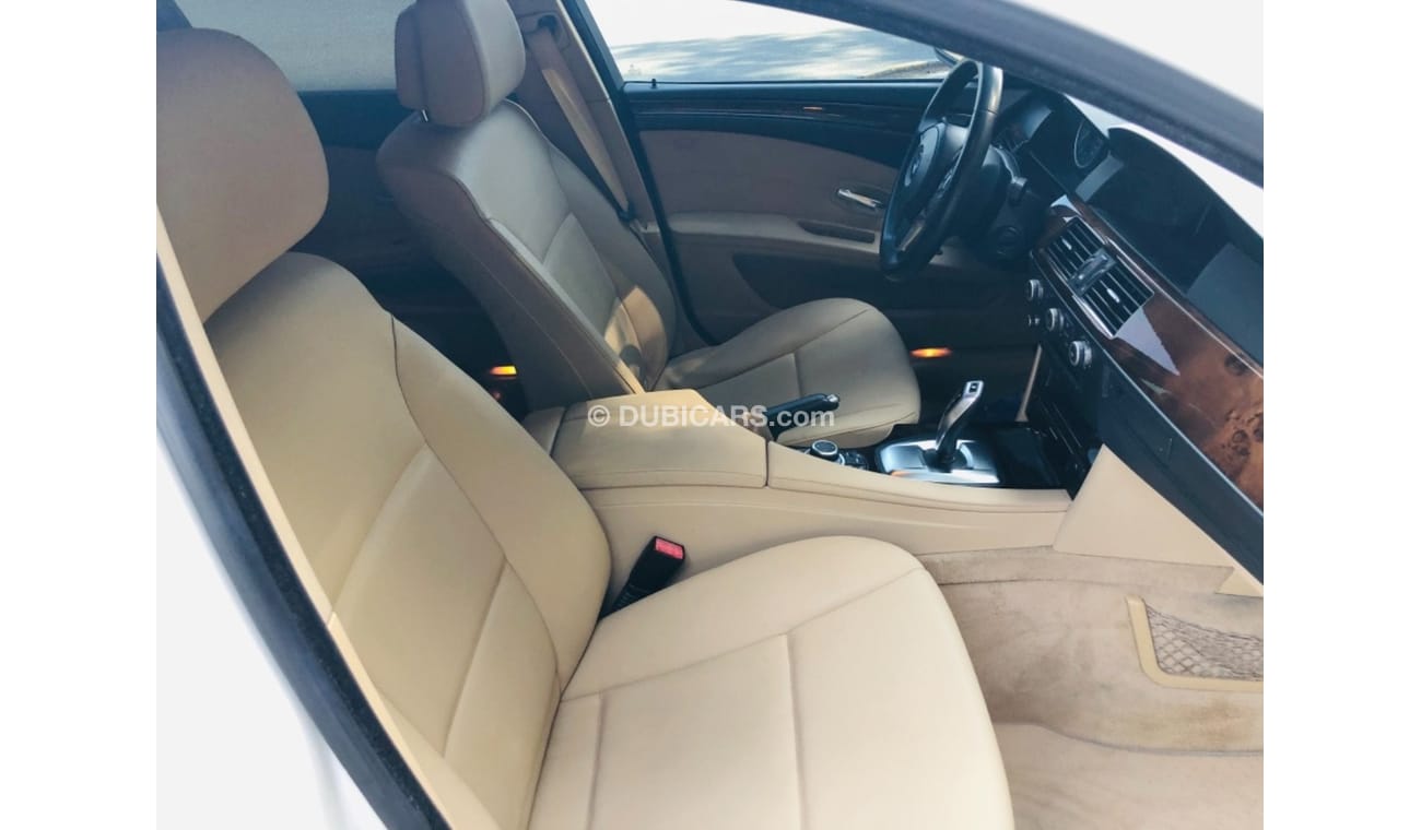 BMW 523i Model 2010 GCC car perfect condition inside and outside full option sun roof leather seats back came