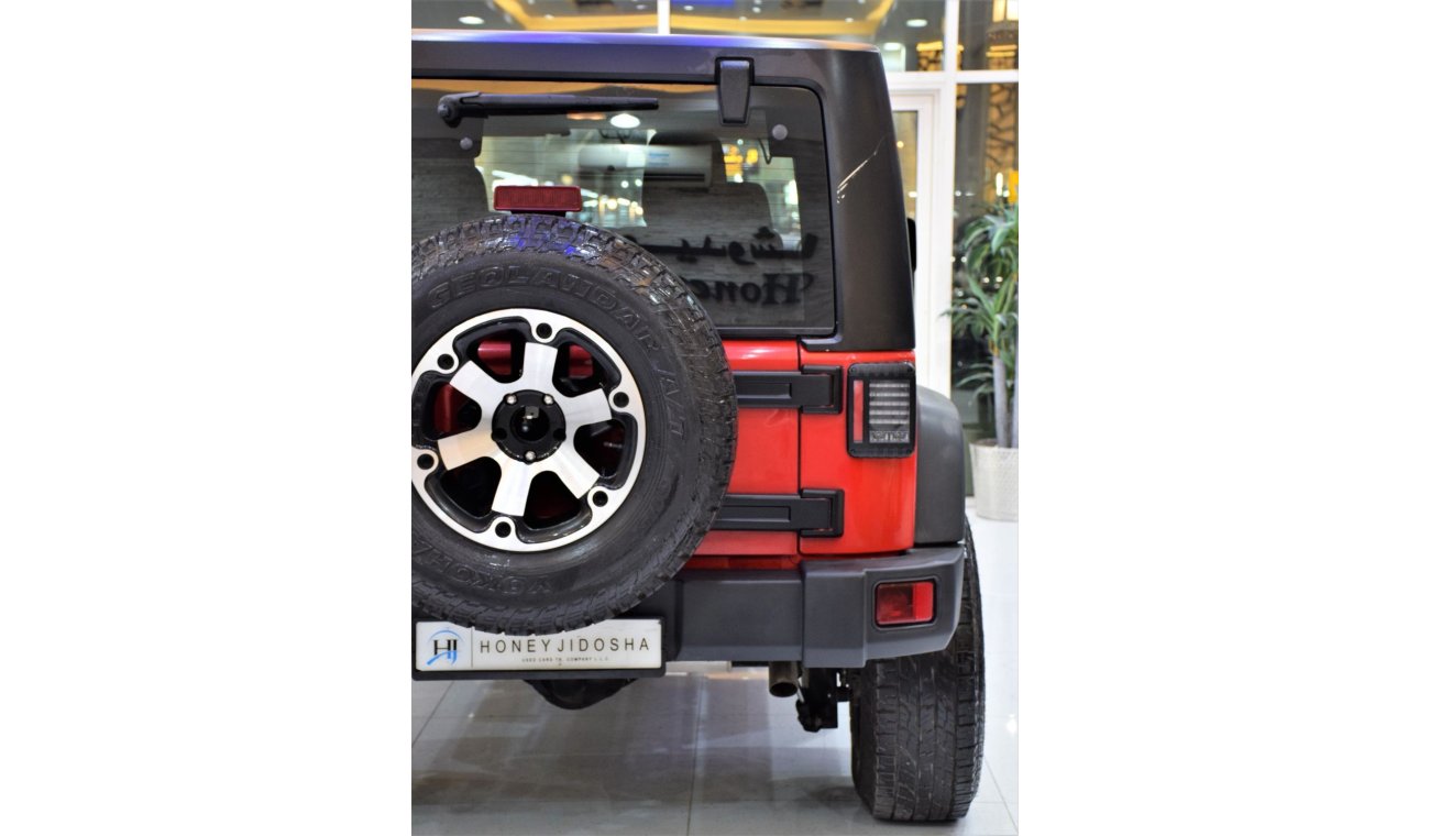 Jeep Wrangler Sport EXCELLENT DEAL for our Jeep Wrangler Sport ( 2015 Model! ) in Red Color! GCC Specs