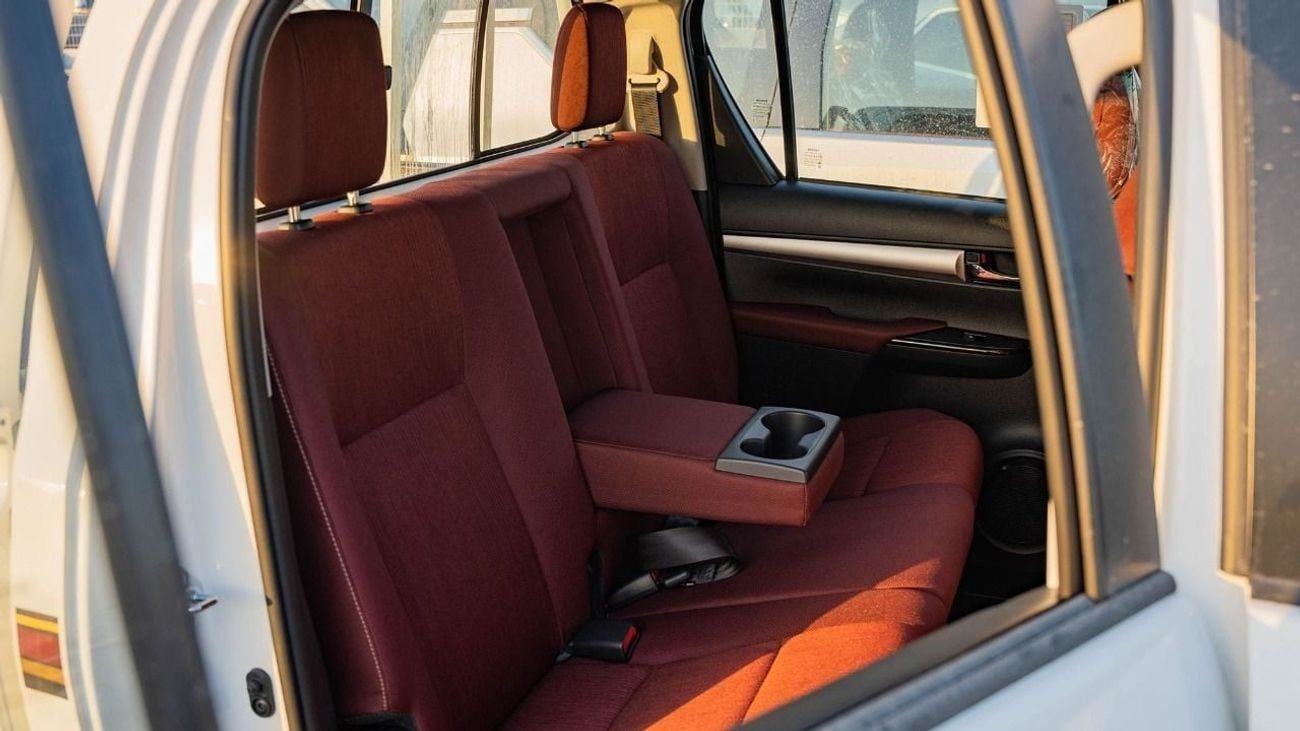 تويوتا هيلوكس Toyota Hilux pickup double cabin Petro engine 2.7L 4x4 white with red interior fully automatic