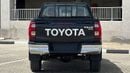 Toyota Hilux 2.7L V4  4*4 Automatic • Black Rims & Red Interior