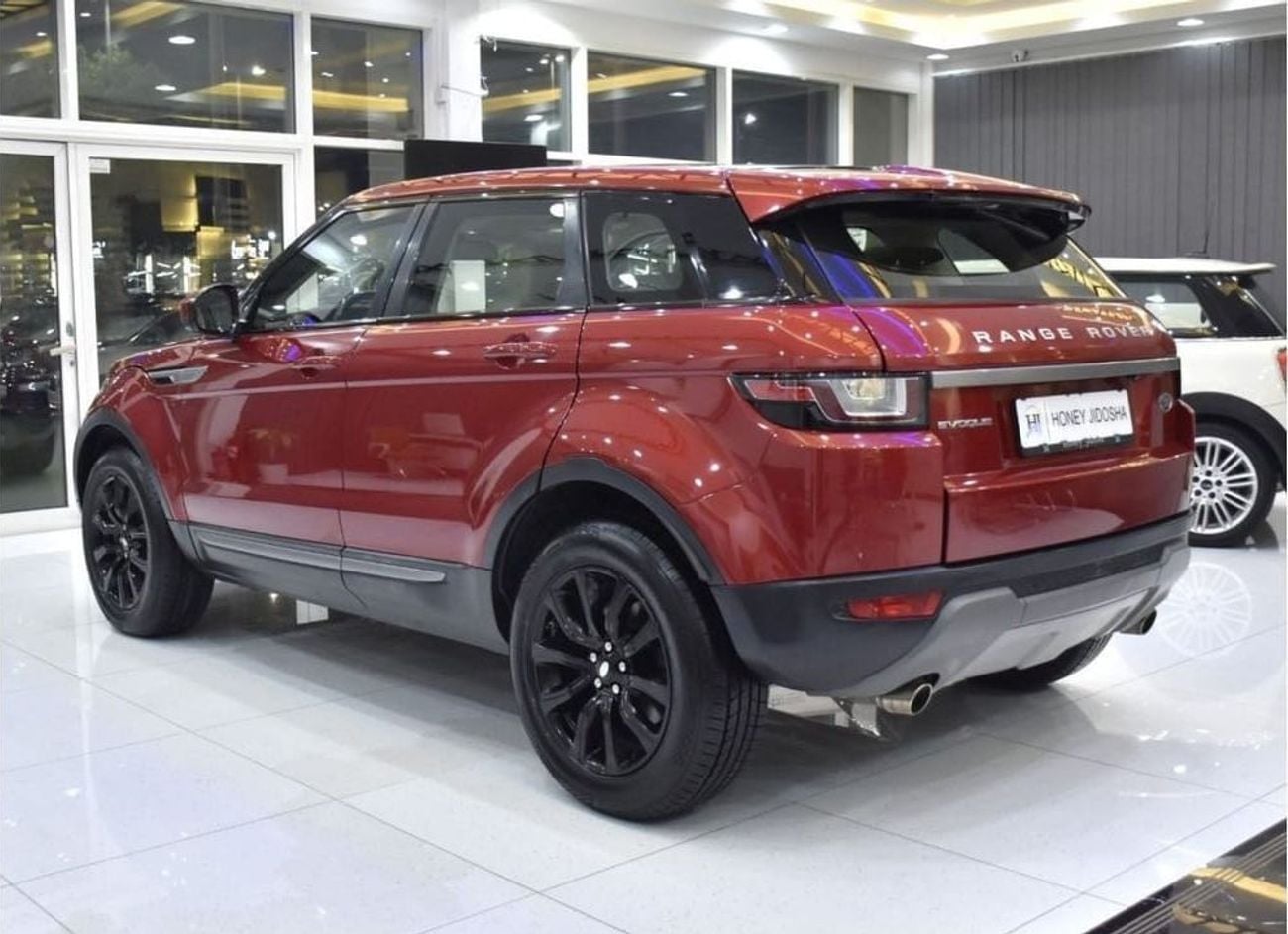 Land Rover Range Rover Evoque HSE EXCELLENT DEAL for our Land Rover Range Rover Evoque ( 2016 Model ) in Red Color GCC Specs