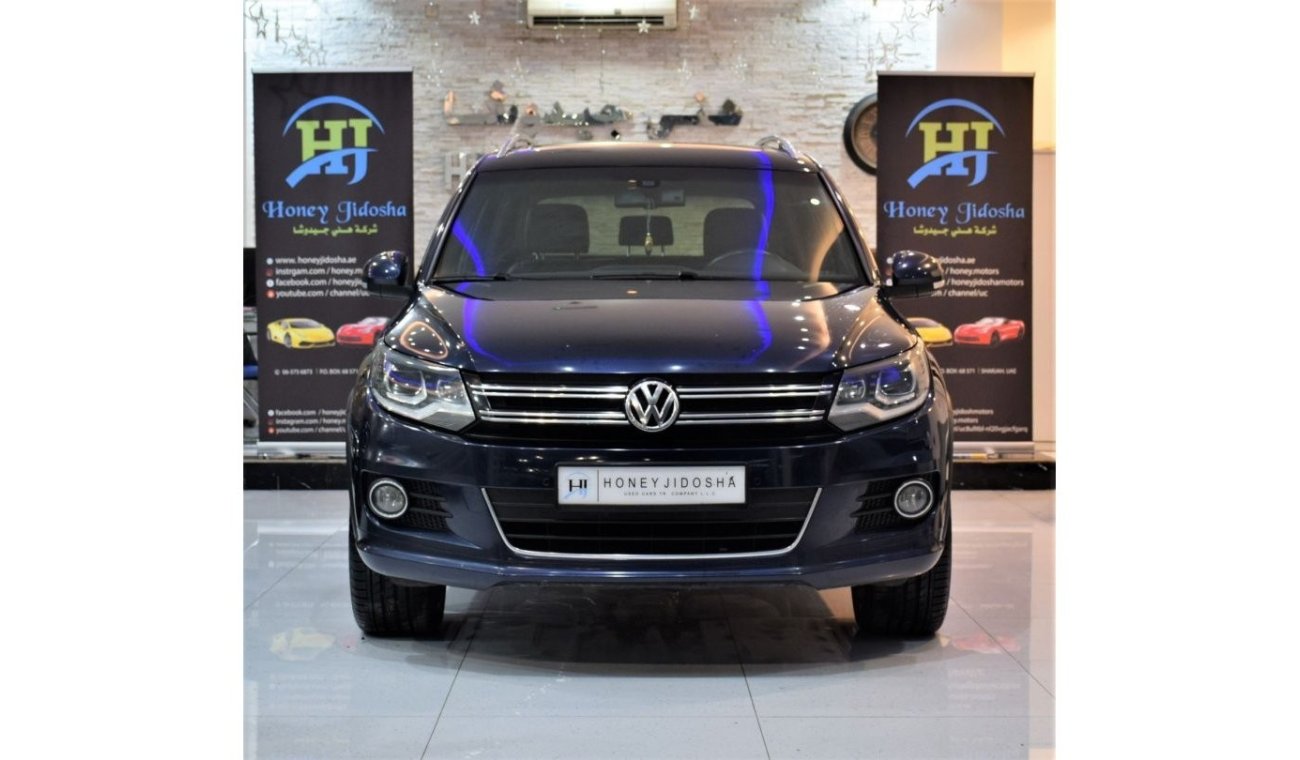 Volkswagen Tiguan EXCELLENT DEAL for our Volkswagen Tiguan R-Line 2.0 TSi 4MOTION 2014 Model!! in Blue Color! GCC Spec