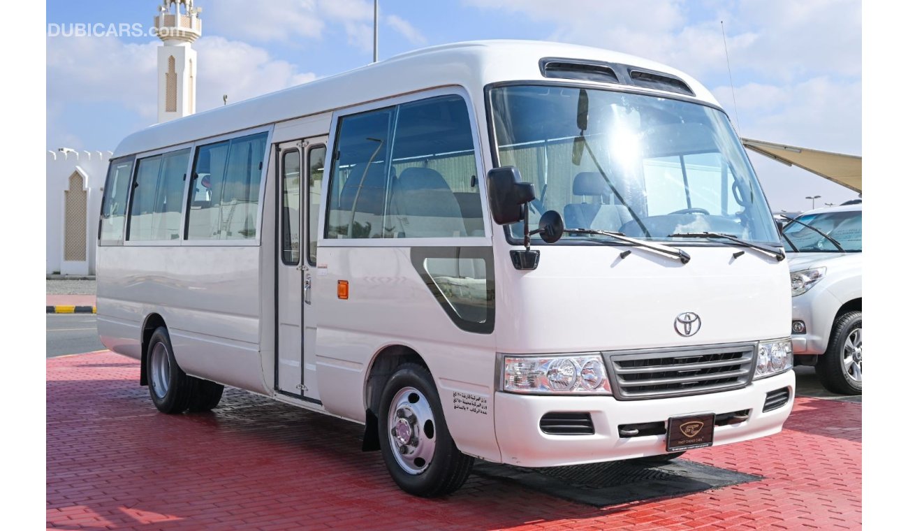 تويوتا كوستر 2016 | TOYOTA COASTER DLX HIGH-ROOF | 26-SEATS DIESEL | GCC | VERY WELL-MAINTAINED | SPECTACULAR CON