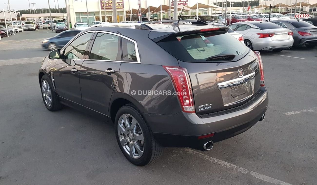 كاديلاك SRX موديل 2011 خليجي فل مواصفات كراسي جلد ومثبت سرعه وتحكم كهربي كامل ونظام صوت ممتاز وكاميرا خلفيه ومدخ
