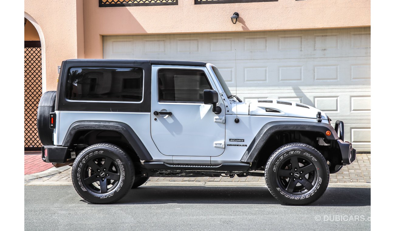 Jeep Wrangler Sport 2014 GCC under warranty with Zero Down-Payment.