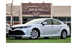 Toyota Camry SE SE Toyota Camry 2018 Toyota Camry 2018 The car is a Gulf agency dyed The car is white with a beig