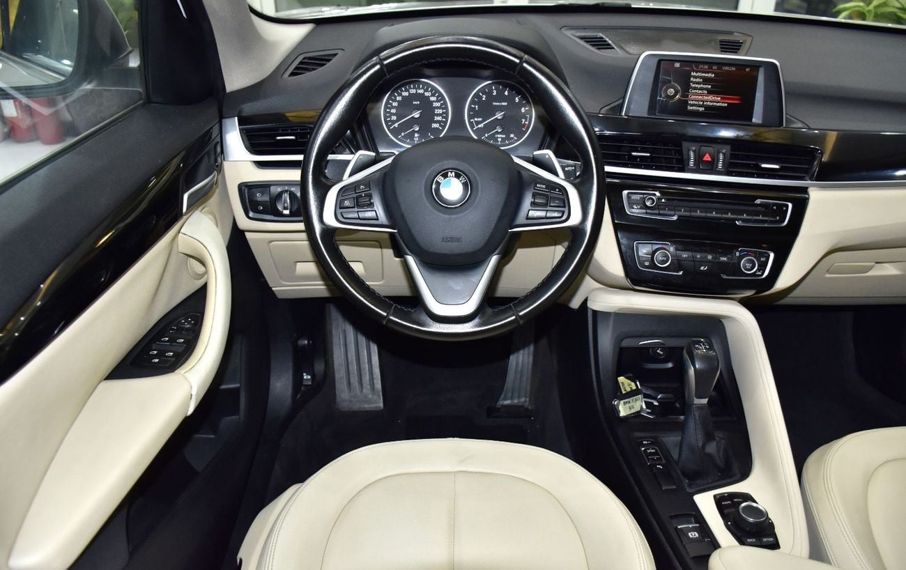 BMW X1 SDRIVE 20i EXCLUSIVE EXCELLENT DEAL for our BMW X1 sDrive20i ( 2017 Model ) in White Color GCC Specs