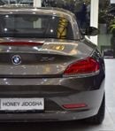 BMW Z4 sDrive 23i EXCLUSIVE EXCELLENT DEAL for our BMW Z4 sDrive23i ( 2012 Model ) in Brown Color GCC Specs