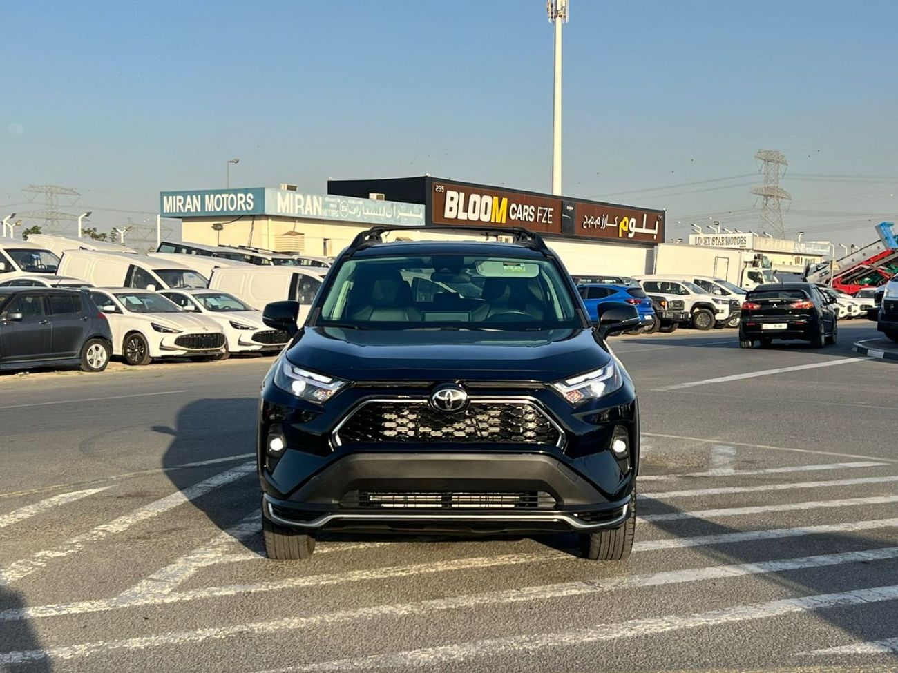 تويوتا راف ٤ 2023 Toyota RAV4 Hybrid Wood Land Edition 2.5L V4 - AWD 4x4 - Rear Camera - Leather Seats
