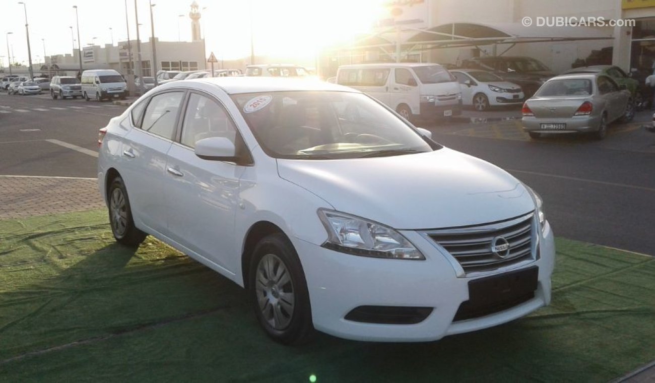 Nissan Sentra 2015 white 1.8 Gcc Excellent Condition without Accidents