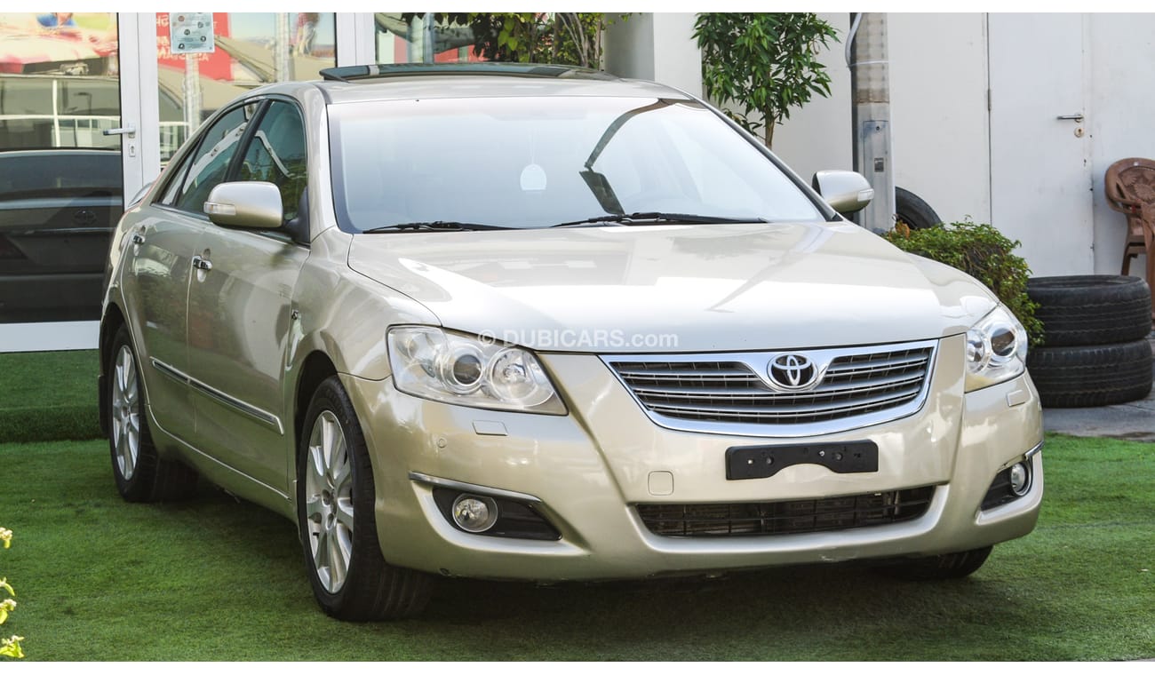 تويوتا أوريون خليجى- بدون حوادث- رقم واحد - بصمة - فتحة - شاشة - كاميرا - مثبت سرعة - رنجات - حساسات -خشب -جناح