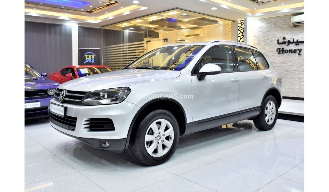Volkswagen Touareg EXCELLENT DEAL for our Volkswagen Touareg ( 2012 Model ) in Silver Color GCC Specs