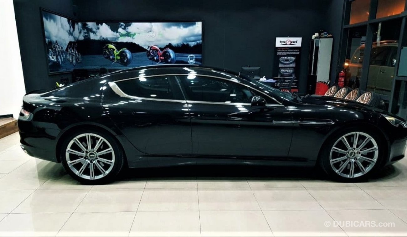 أستون مارتن رابيد ASTON MARTIN RAPIDE 2011 MODEL GCC CAR IN BEAUTIFUL SHAPE WITH ONLY 74K KM