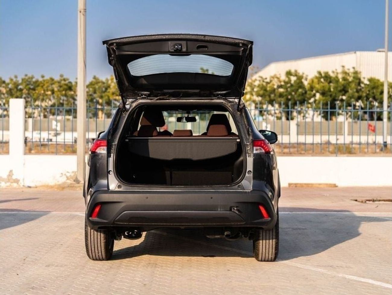 تويوتا كورولا كروس 2024 TOYOTA COROLLA CROSS 1.8 Hybrid MID - GREY METTALIC inside RED | Export Only