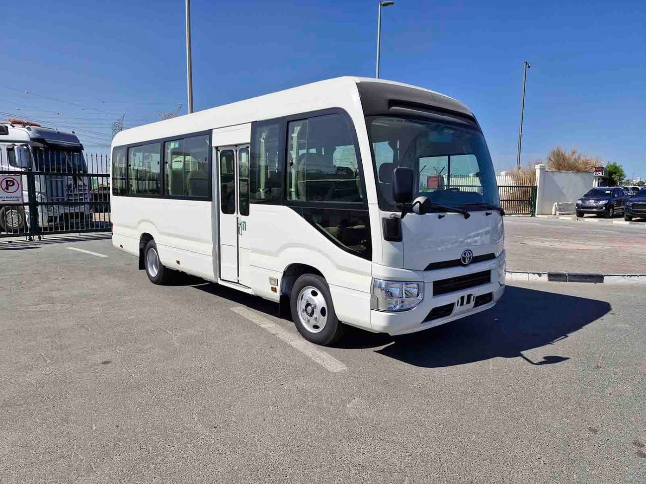تويوتا كوستر ECTALM003 - 2025 Toyota Coaster – 2.8L Diesel Auto – 22 Seats, Cool Box