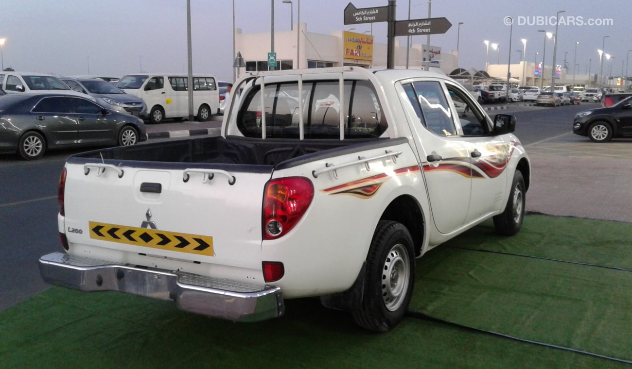 Mitsubishi L200 L200 WHITE 2014 KHALIGE NO ACCEDINT PERFECT